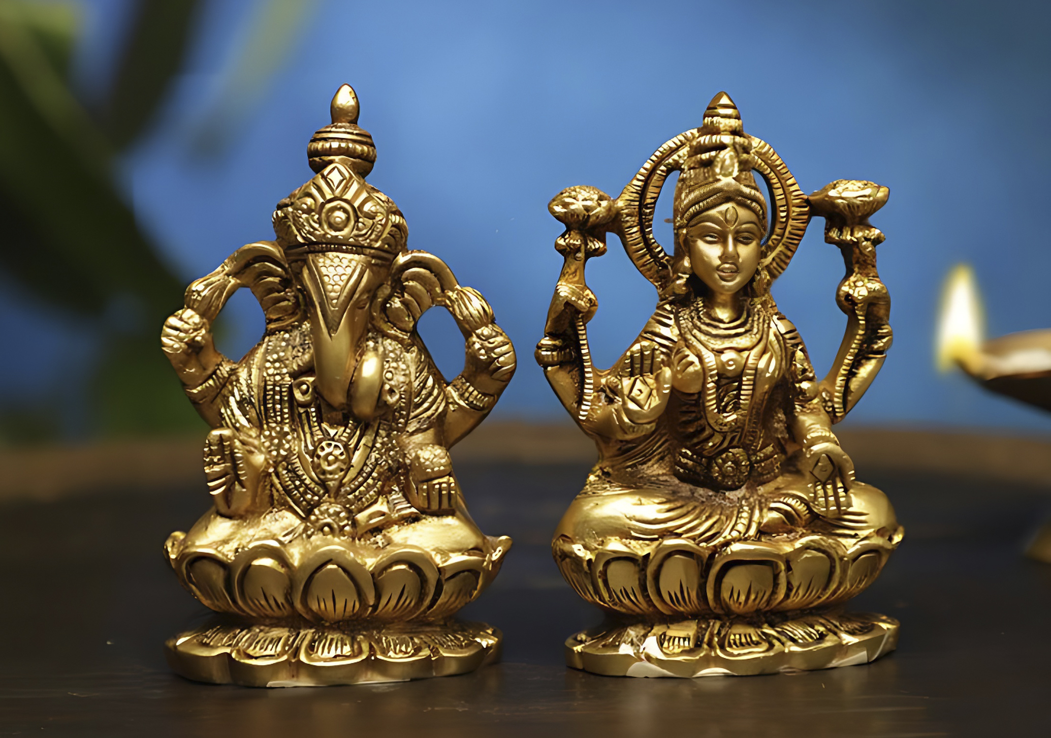 brass lakshmi and ganesha